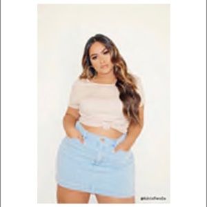 Light wash blue jean mini skirt